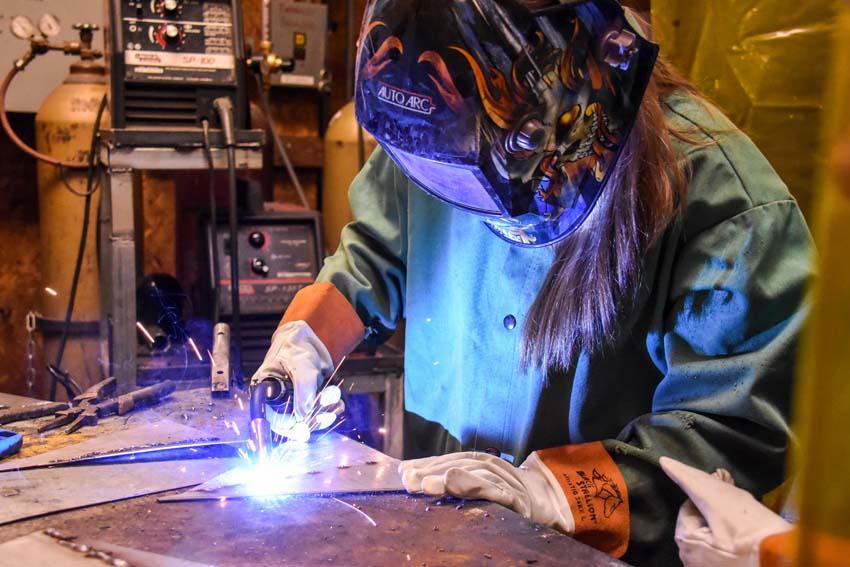 Images of students in Welding class.