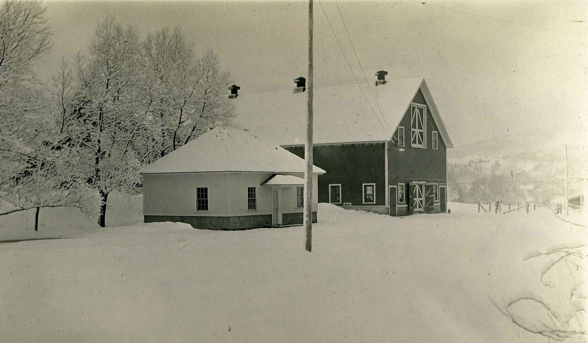 Historic photo of the Creamery and Vail Barn. 